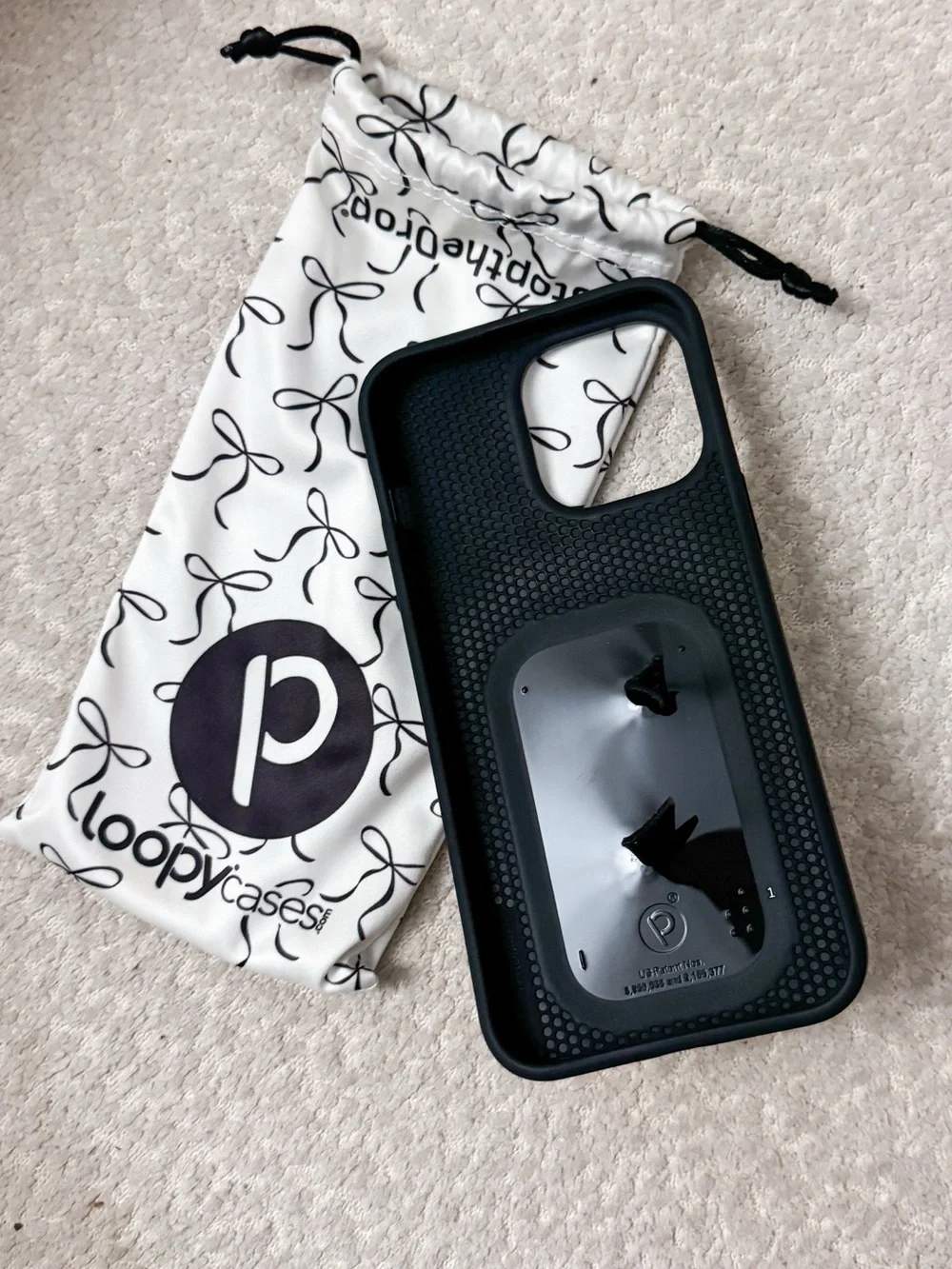 Loopy White Phone Case with Black Ribbon Bow Pattern and Black Grip 15 pro max